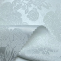 Poliéster Spandex tejido blanco floral jacquard tela satinada